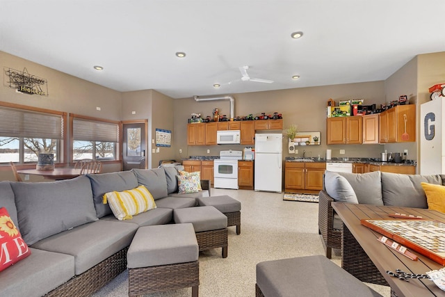 living room featuring ceiling fan