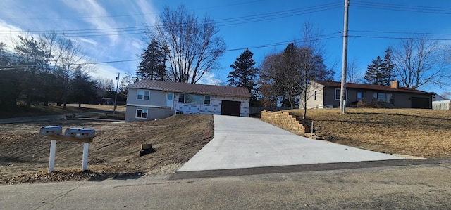 view of front of property featuring a garage