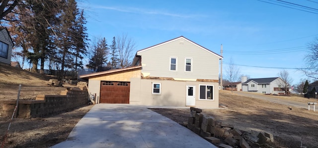 exterior space with a garage