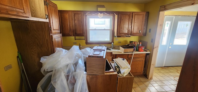 kitchen featuring light tile patterned flooring