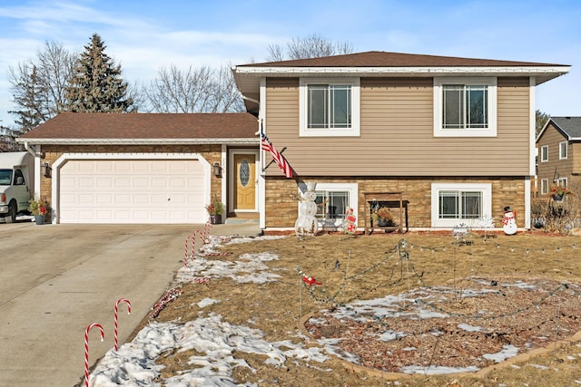 split level home featuring a garage