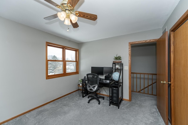 home office with carpet flooring and baseboards