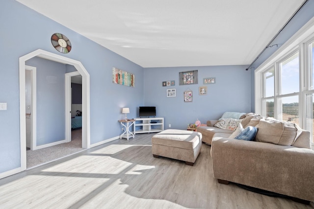 living room with light hardwood / wood-style floors