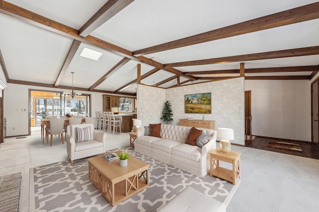 living room with light carpet, an inviting chandelier, lofted ceiling with beams, and baseboards