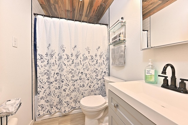 full bathroom featuring hardwood / wood-style flooring, shower / bathtub combination with curtain, vanity, and toilet