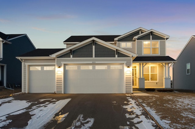 view of front of property featuring a garage