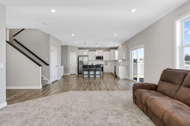 living room featuring light wood-type flooring