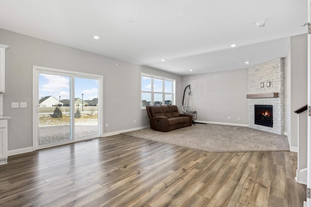 living room featuring hardwood / wood-style floors and a fireplace