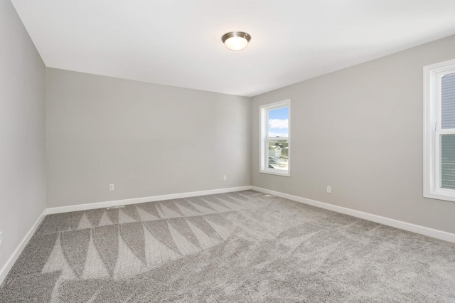 unfurnished room with carpet