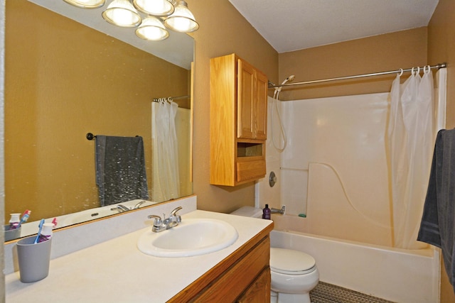 full bathroom with shower / tub combo with curtain, vanity, and toilet