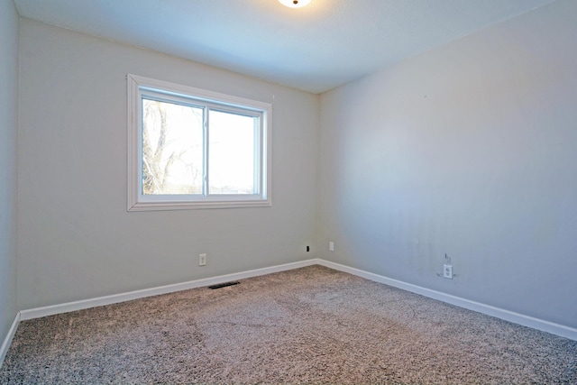 view of carpeted spare room