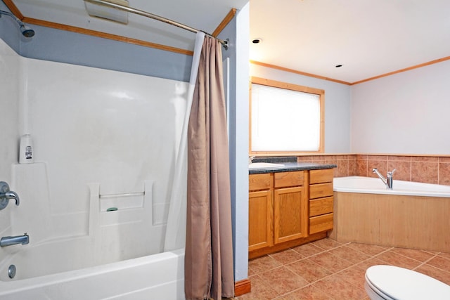 full bathroom featuring tile patterned floors, toilet, sink, tile walls, and ornamental molding