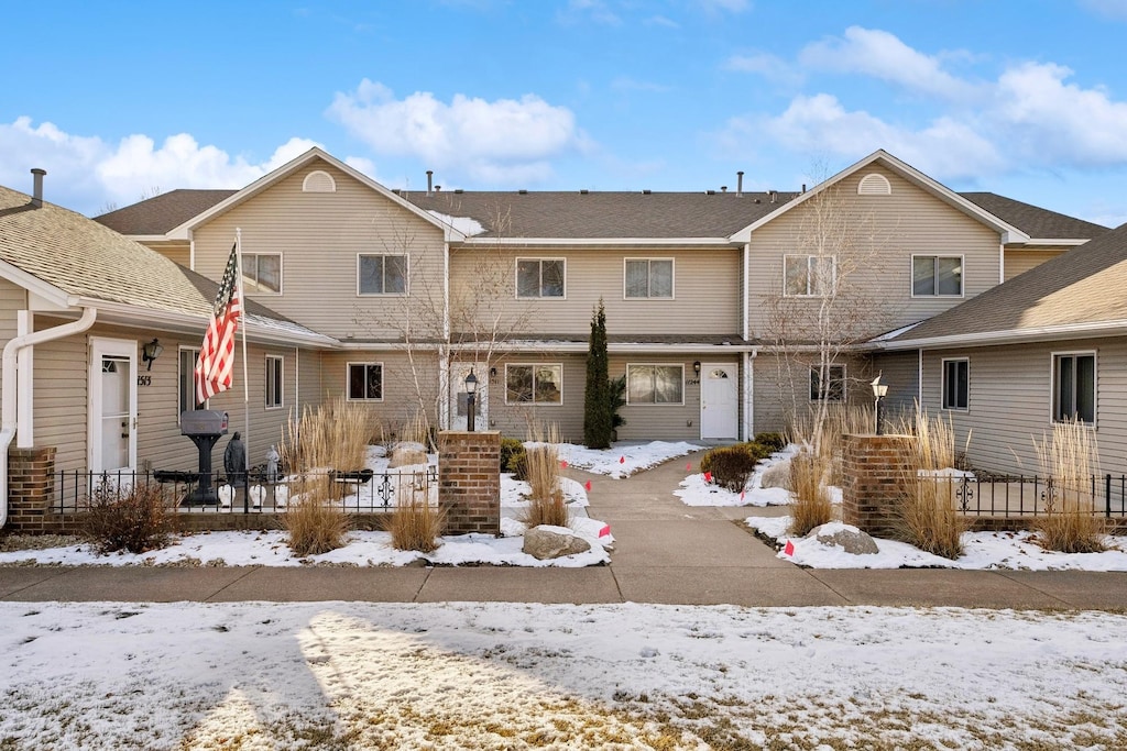 view of snow covered property