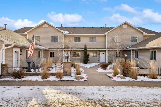 view of snow covered property