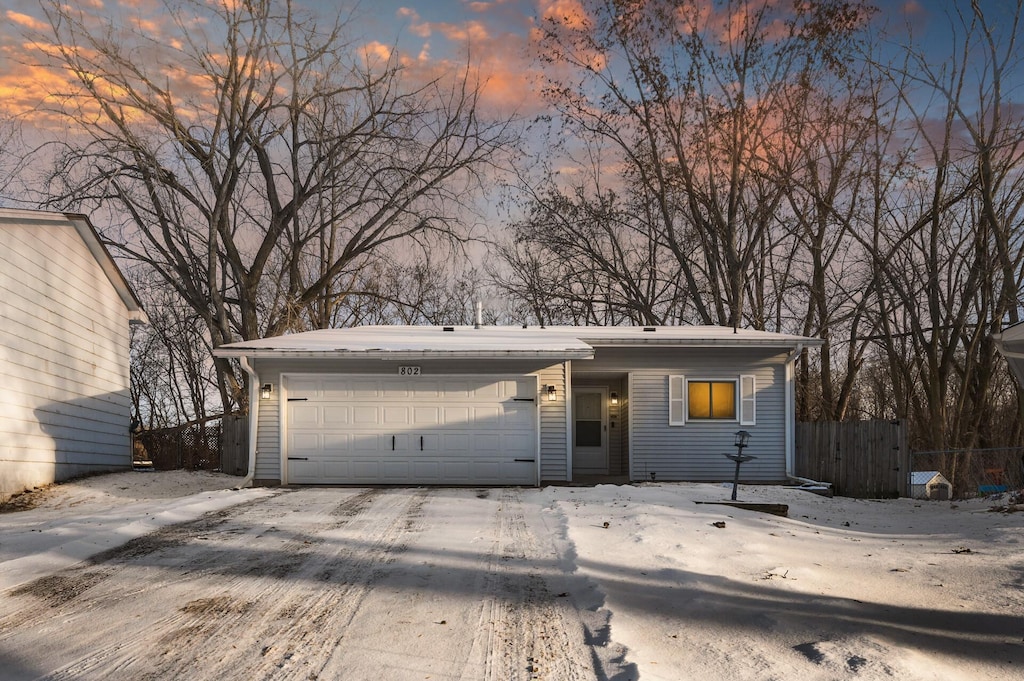 view of front of home with a garage