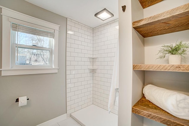 bathroom with a shower with curtain