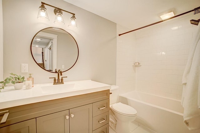 full bathroom with vanity, toilet, tiled shower / bath combo, and tile patterned flooring