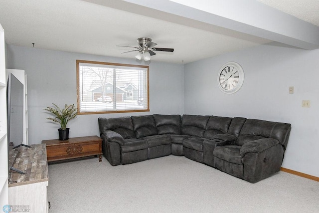 living room with ceiling fan and light colored carpet