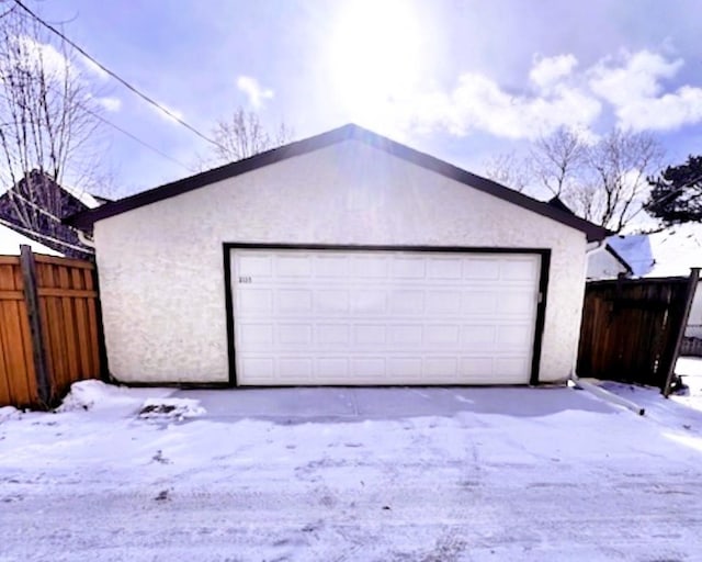 view of snow covered garage