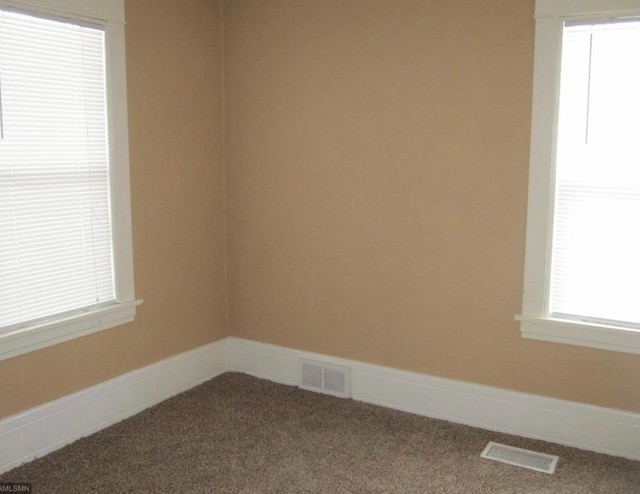 view of carpeted spare room