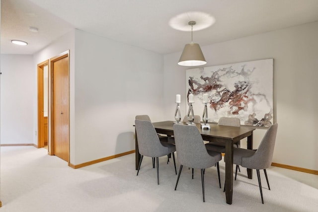 dining area with carpet flooring