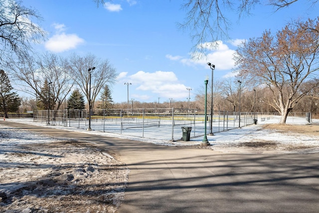 surrounding community featuring tennis court