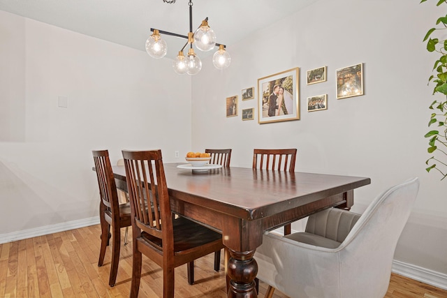 dining area with light wood-type flooring