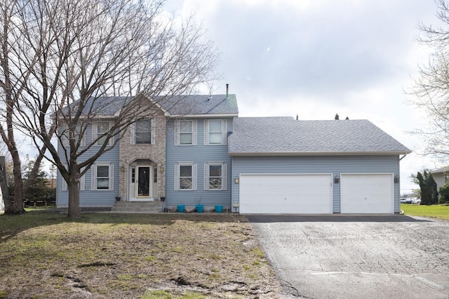 view of front of house with a garage