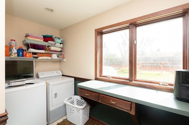 laundry room featuring washing machine and dryer