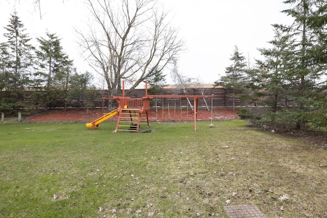 view of jungle gym featuring a yard