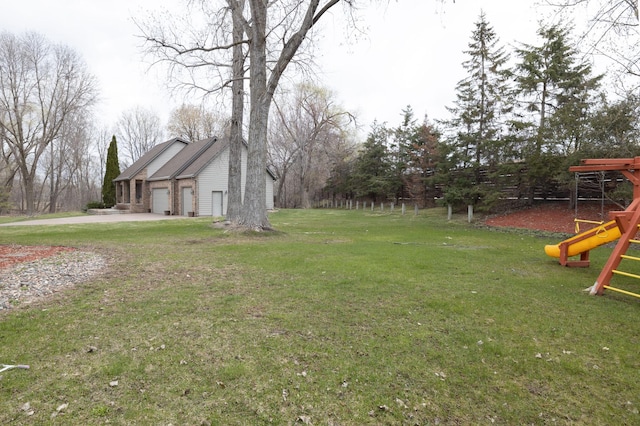 view of yard with a garage