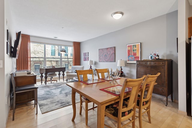 dining room featuring light wood finished floors