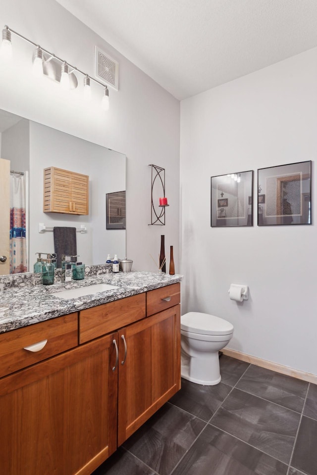 full bathroom with visible vents, a shower with shower curtain, toilet, tile patterned floors, and vanity