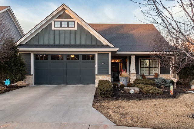 craftsman house with a garage