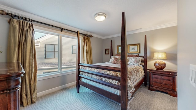 carpeted bedroom with crown molding