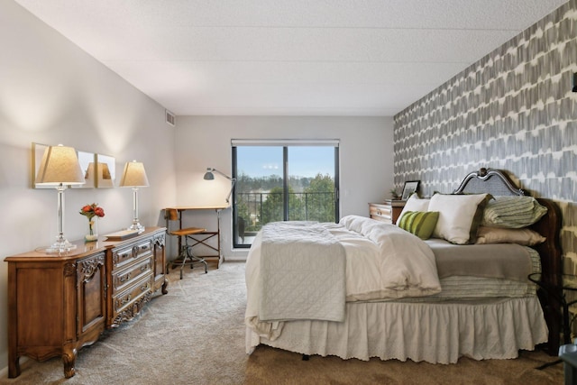 bedroom featuring light colored carpet