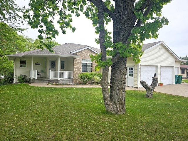 8785 Ilex Pl NW, Rice, MN 56367 - single story home featuring a porch, an attached garage, a front lawn, concrete driveway, and a shingled roof