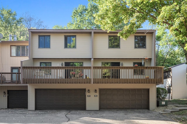 view of front of house featuring a balcony