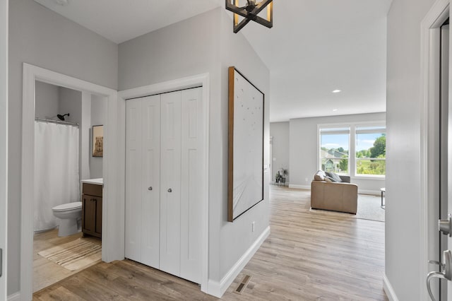 hall featuring light hardwood / wood-style flooring