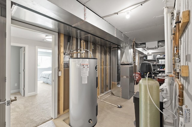 utility room featuring electric water heater