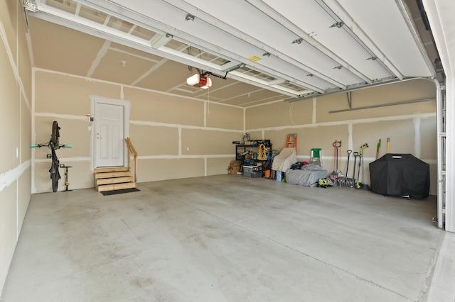 garage featuring a garage door opener