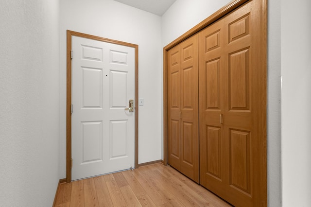 doorway to outside with light hardwood / wood-style floors