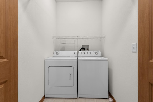 laundry room featuring independent washer and dryer