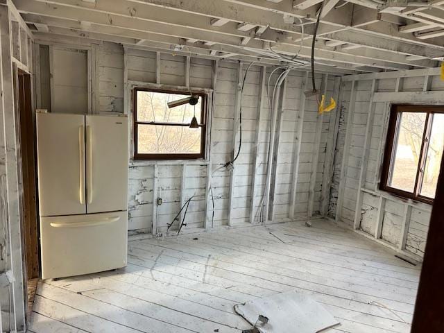 basement with refrigerator