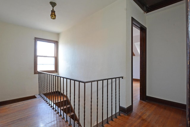 staircase featuring hardwood / wood-style flooring