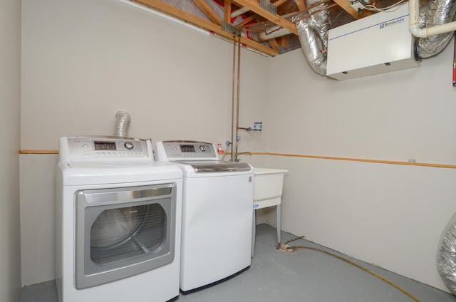 laundry room featuring washing machine and dryer