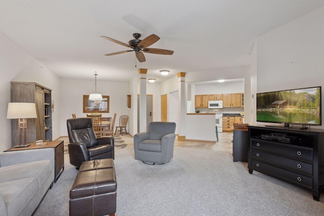 living room with light carpet and ceiling fan