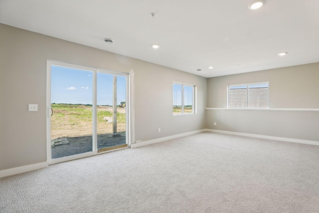 view of carpeted spare room