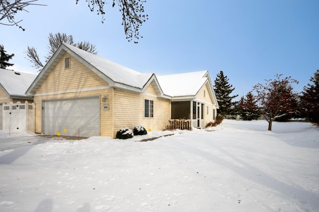 view of front of home featuring fence