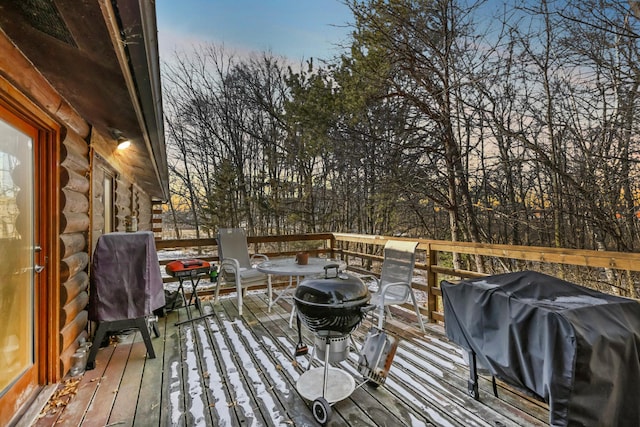 wooden terrace with grilling area